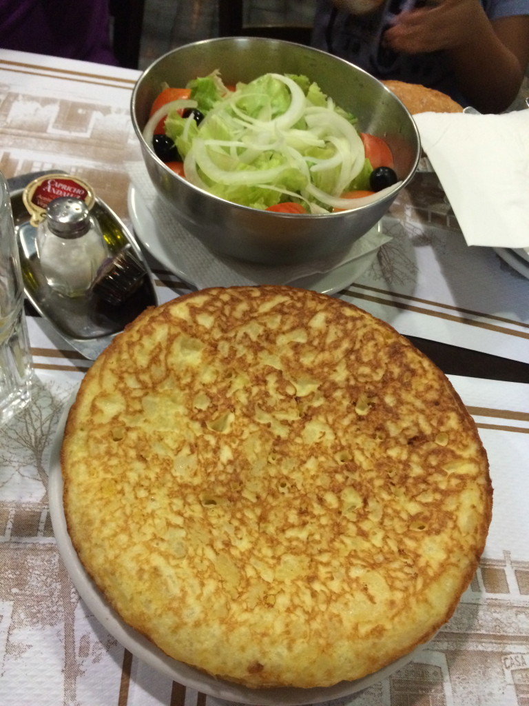 This egg and potato pancake was served with grilled chicken and a side salad. It's wonderful!