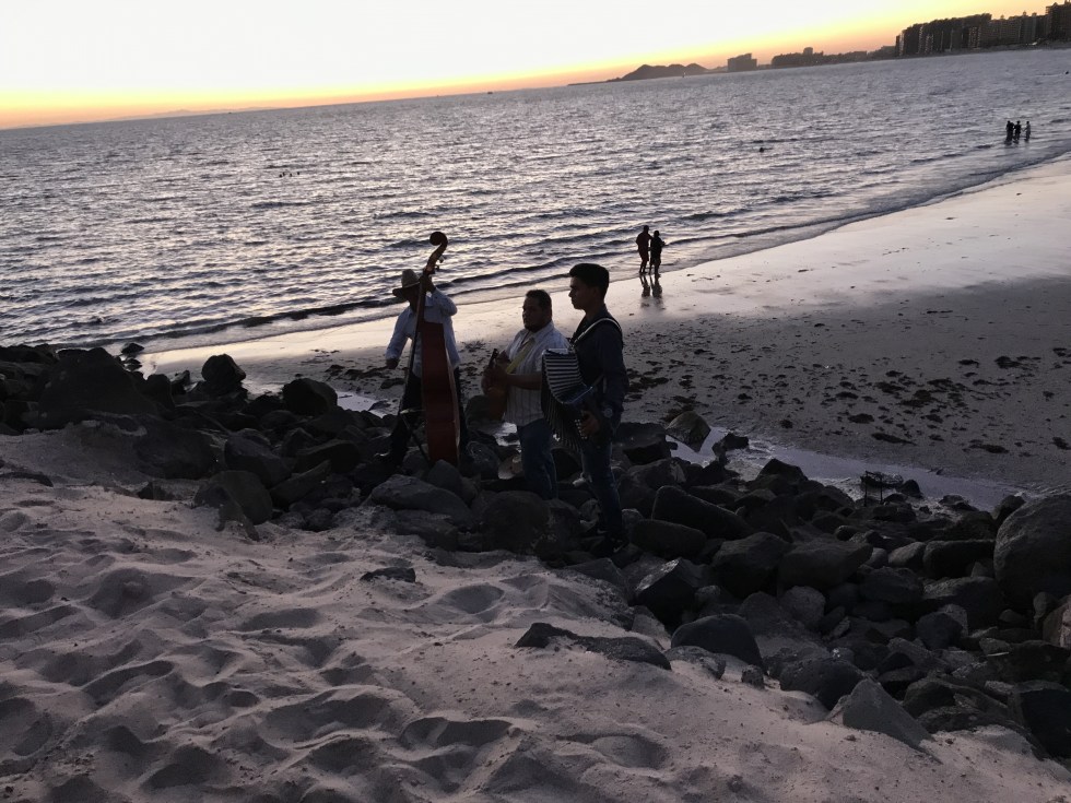 things to do in puerto penasco - mariachi band on beach at sunset