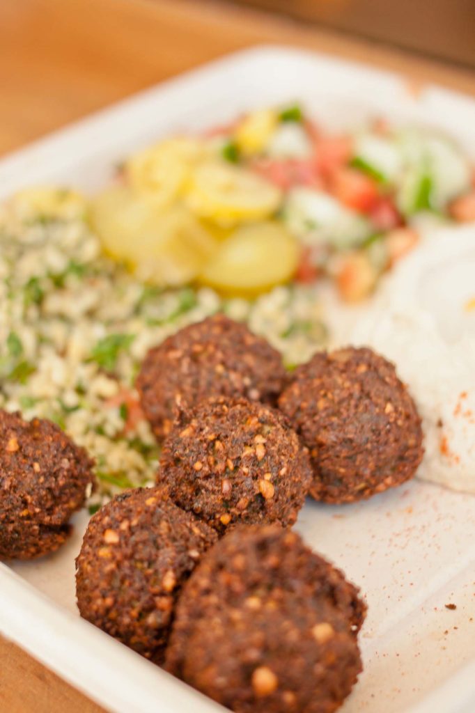 Falafel platter with tabbouleh, pickles and hummus